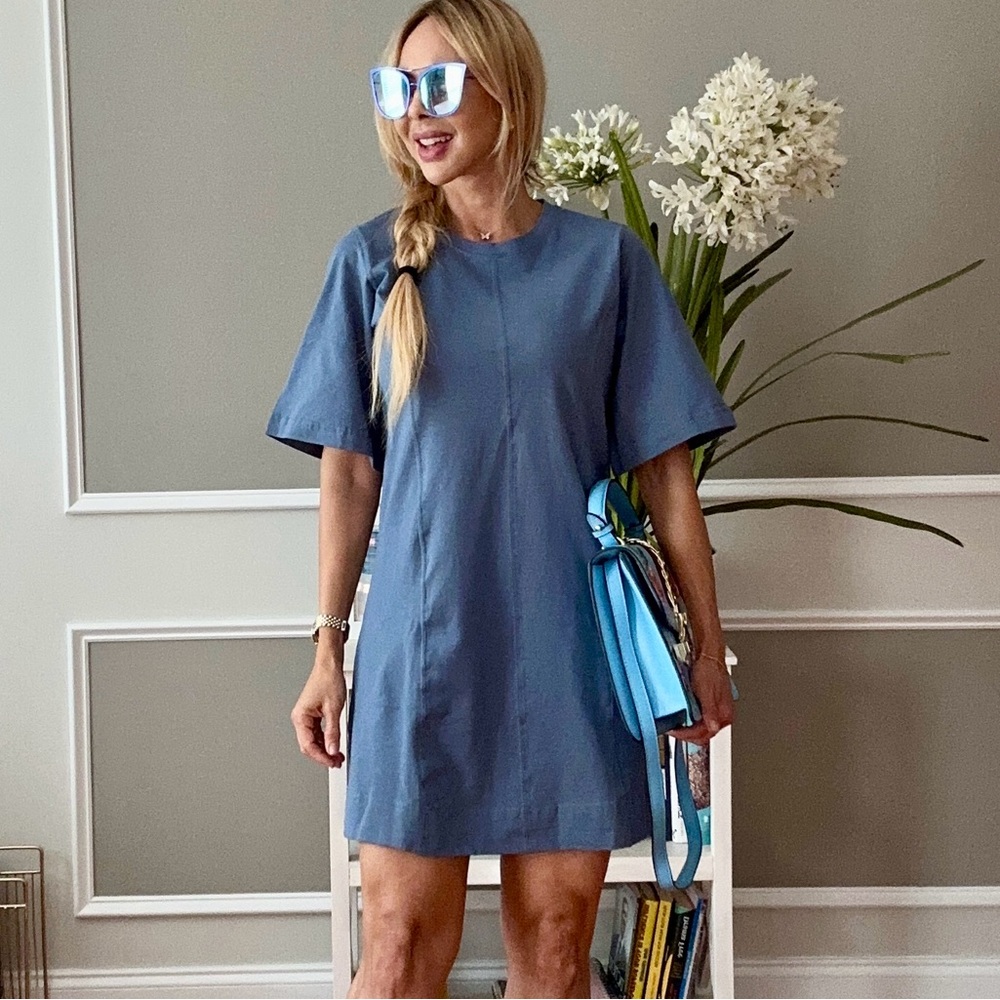 Brand new casual summer dresses in size small, available in dark blue and beige.